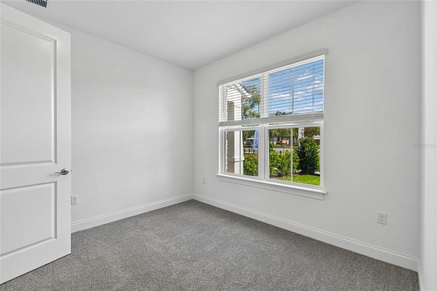 Spacious, unfurnished interior of a new home in Townes at Northlake, Oviedo (Image 19).