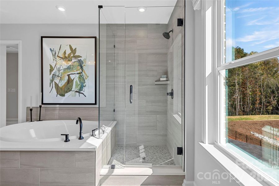 Semi-frameless walk-in shower with tile pan and premium design. Semi-frameless walk-in shower with tile pan and premium design.