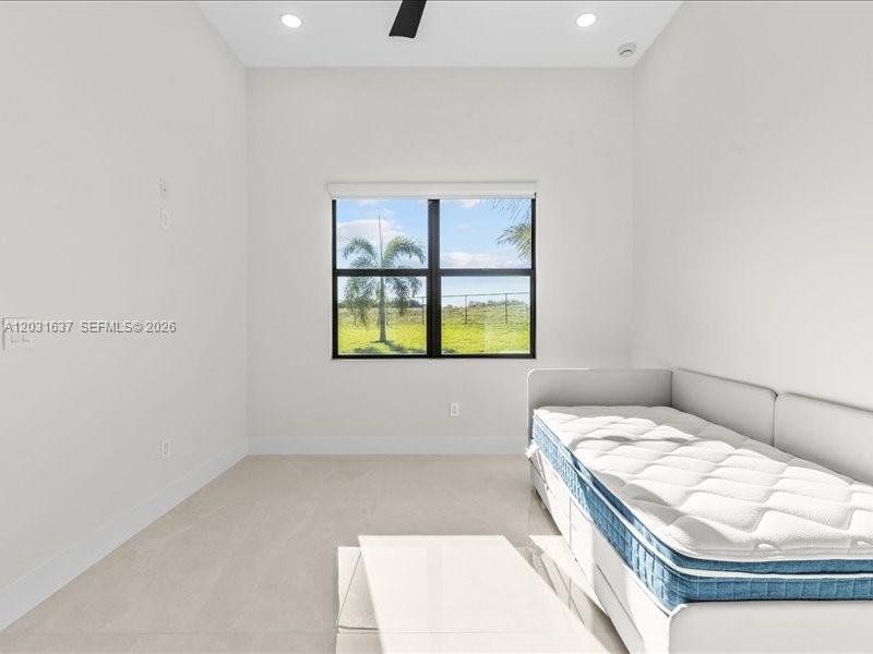 Furnished interior view inside a new home in , Port St. Lucie (Image 8).