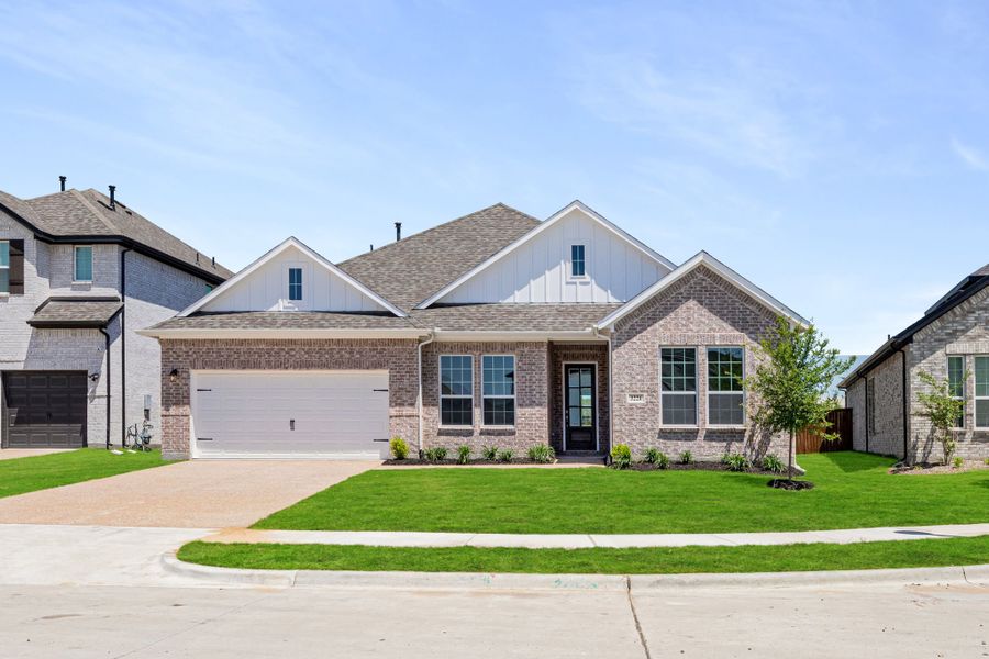 Representative exterior photo of a completed home built from the Hawkins by UnionMain Homes in Lake Breeze, Lavon, TX (Image 20). Representative exterior photo of a completed home built from the Hawkins by UnionMain Homes in Lake Breeze, Lavon, TX (Image 20).