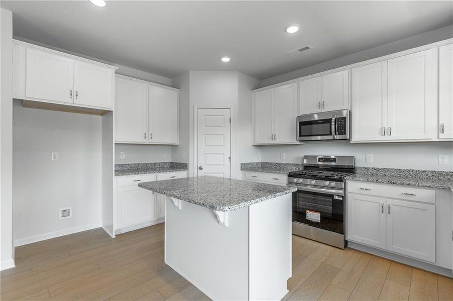 Furnished interior view inside a new home in Capstone Estates, Apison (Image 13).