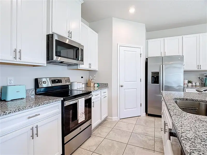 Furnished interior view inside a new home in , Davenport (Image 8).