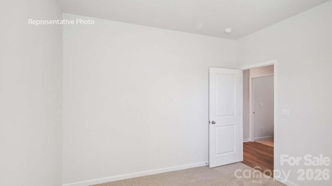 Spacious, unfurnished interior of a new home in Wallace Springs, Statesville (Image 15).