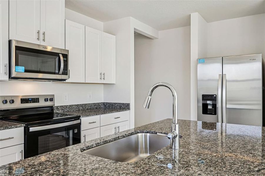Furnished interior view inside a new home in Lake Deer Estates - Classic Series, Poinciana (Image 9).