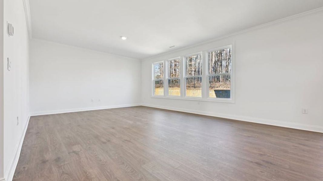 Representative unfurnished interior of a home built from the Wylie by D.R. Horton in Eagle Creek, Fuquay Varina (Image 19).