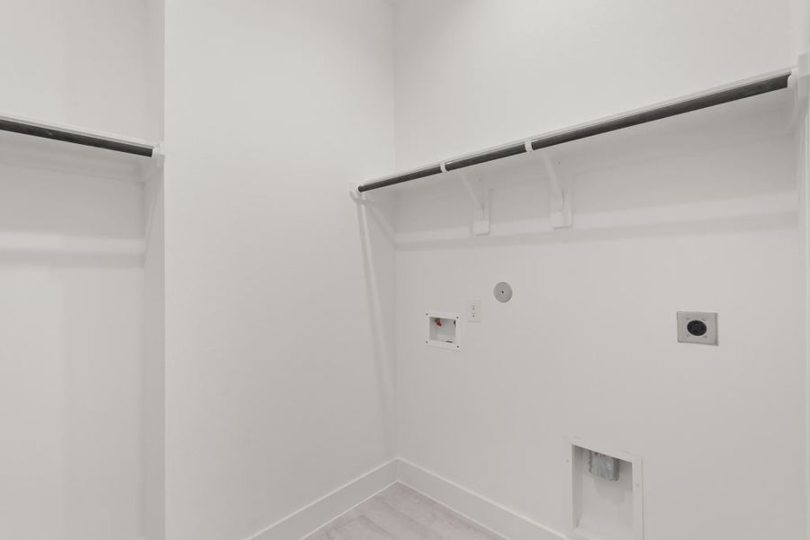 Representative unfurnished interior of a home built from the Mickelson by Chesmar Homes in Riceland Alley Loads, Mont Belvieu (Image 94).