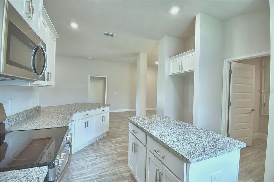 Furnished interior view inside a new home in Lake Juliana Estates, Auburndale (Image 8).