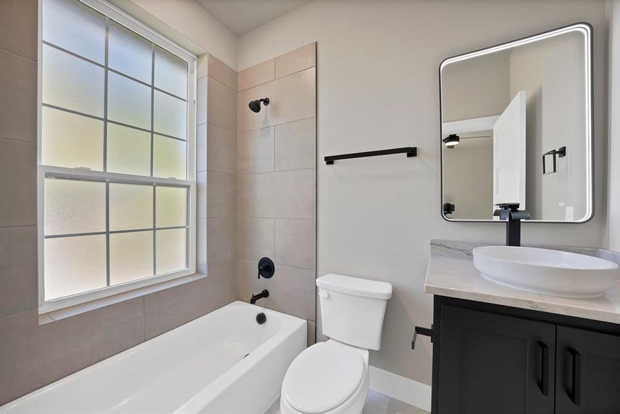 Bathroom with shower / washtub combination and vanity Bathroom with shower / washtub combination and vanity