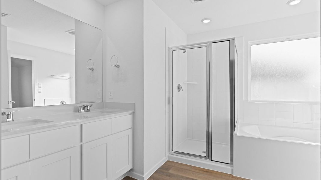 Furnished interior view inside a new home in Caldwell Crossing, Iowa Colony (Image 5).
