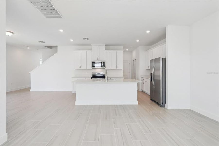Furnished interior view inside a new home in Cyrene at Minneola - Villas, Montverde (Image 11).