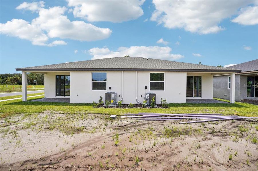Exterior details and patio area of a home in Ridgehaven - Villas, Ormond Beach (Image 21).