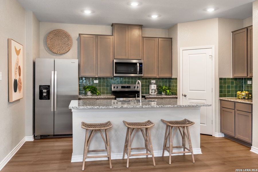 Furnished interior view inside a new home in Woodside Farms, Seguin (Image 4).