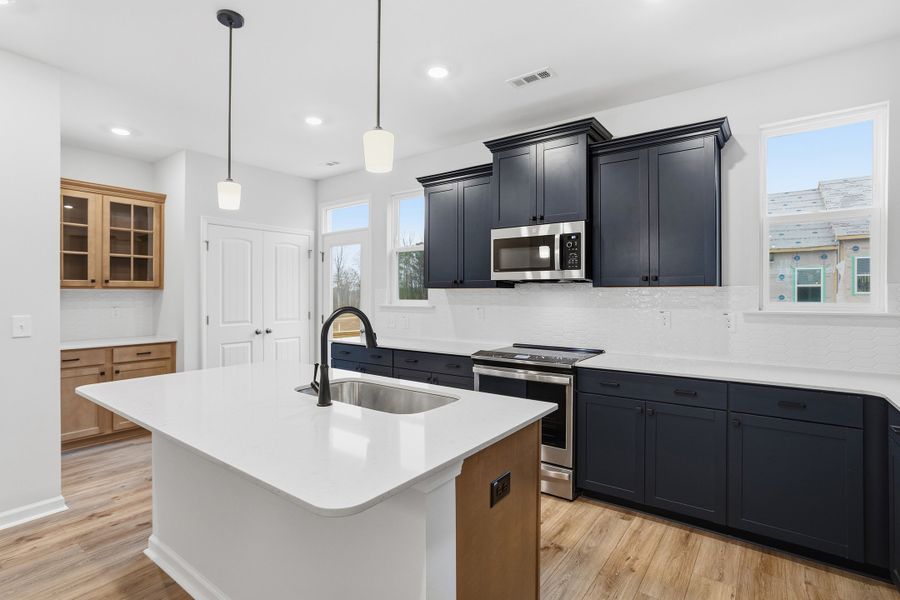 Furnished interior view inside a new home in Renaissance at White Oak, Garner (Image 9).