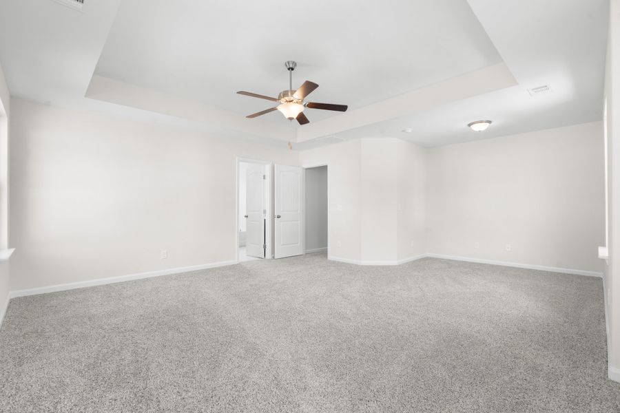 Representative unfurnished interior of a home built from the The Dalton by Smith Family Homes in Ramsey Landing, Rincon (Image 20).
