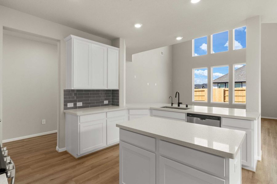 Kitchen. Note: Sample product photo - actual exterior and interior selections may vary by homesite