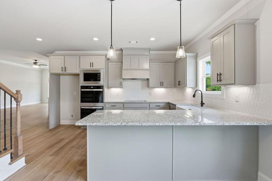 Furnished interior view inside a new home in , Monroe (Image 7).