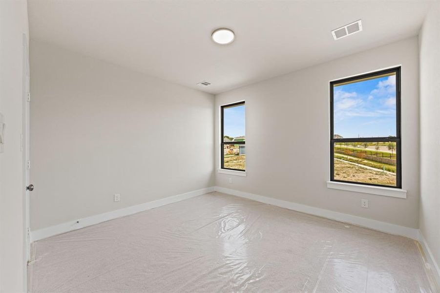 Spacious, unfurnished interior of a new home in The Heights at Uptown Celina, Celina (Image 18).