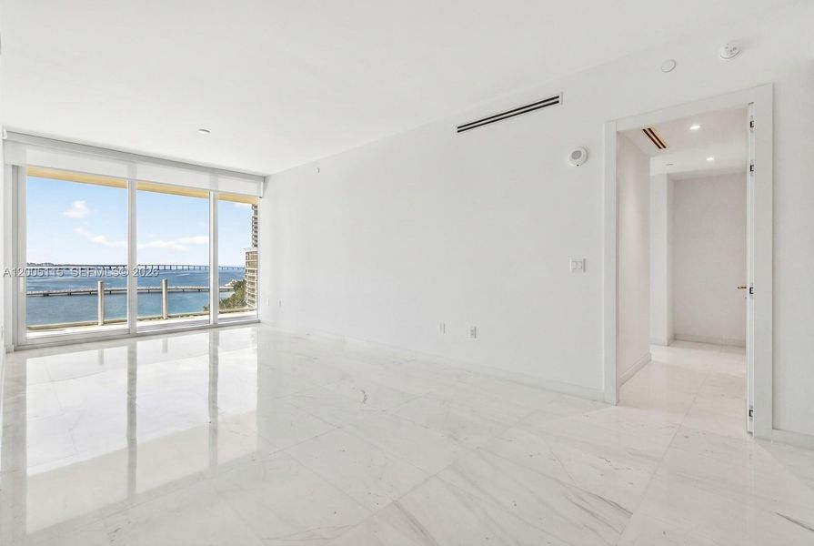 Spacious, unfurnished interior of a new home in Aston Martin Residences, Miami (Image 10).