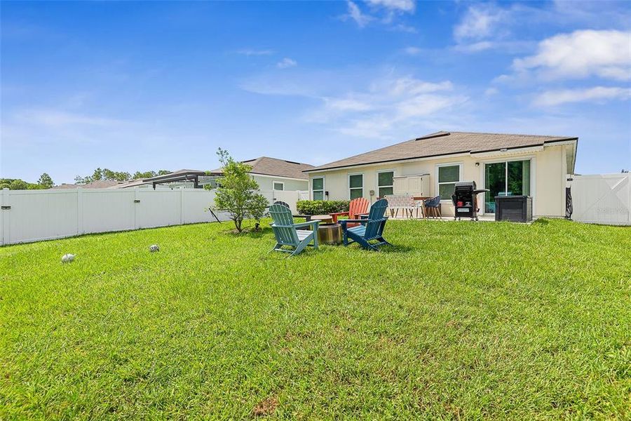 Exterior details and patio area of a home in Sawmill Branch, Palm Coast (Image 27).