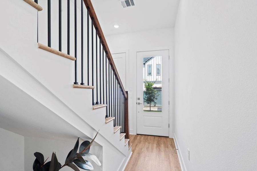 Area located under stairs - perfect for pets or extra storage