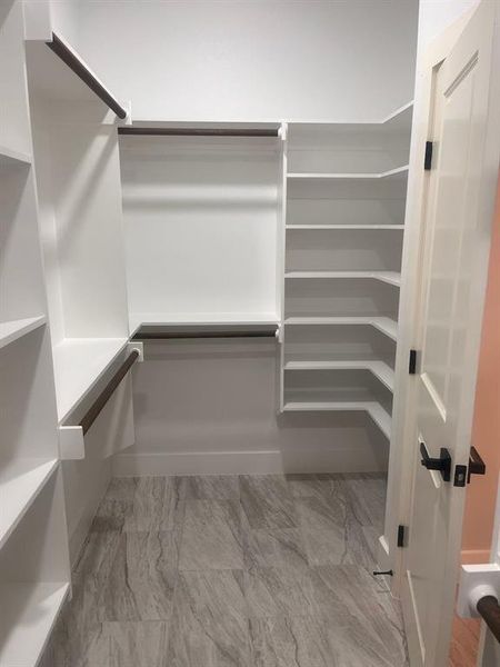 Primary walk in spacious closet