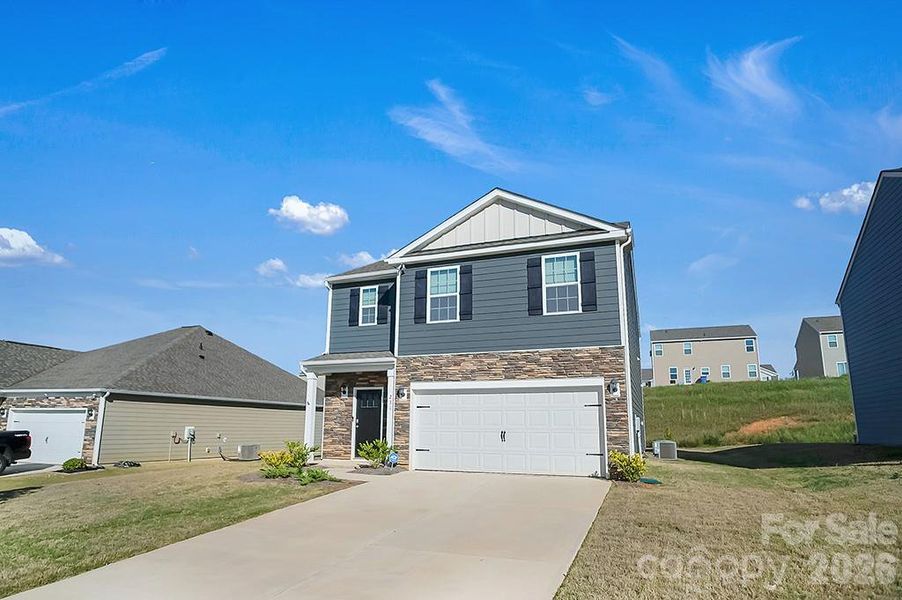 Front exterior of a new home in , Kings Mountain, NC, highlighting curb appeal (Image 28).