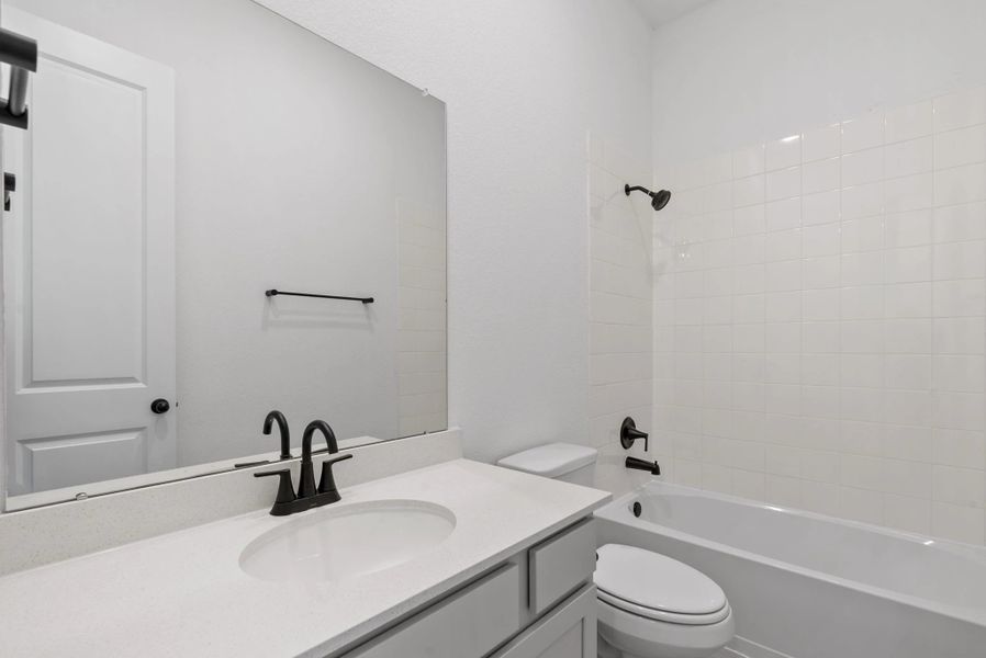 Furnished interior view inside a new home in Ashland, Angleton (Image 9).