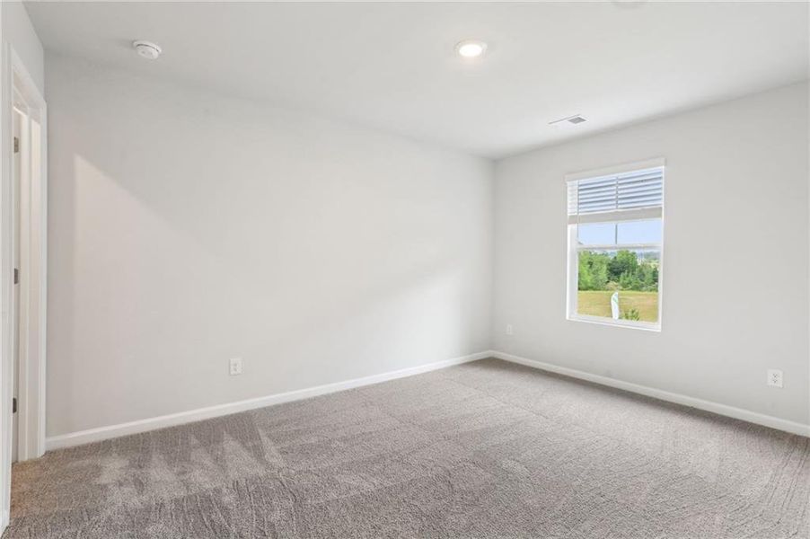 Spacious, unfurnished interior of a new home in The Hills at Cedar Creek, Winder (Image 24).