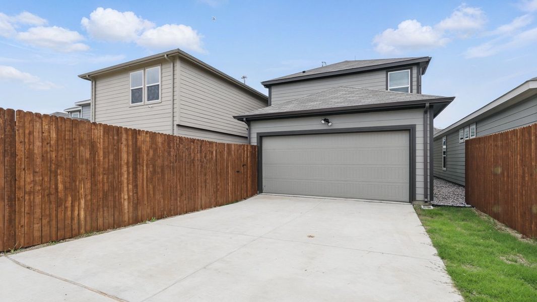 Representative exterior photo of a completed home built from the HAZELNUT by D.R. Horton in Orchard Village, Fort Worth, TX (Image 22).