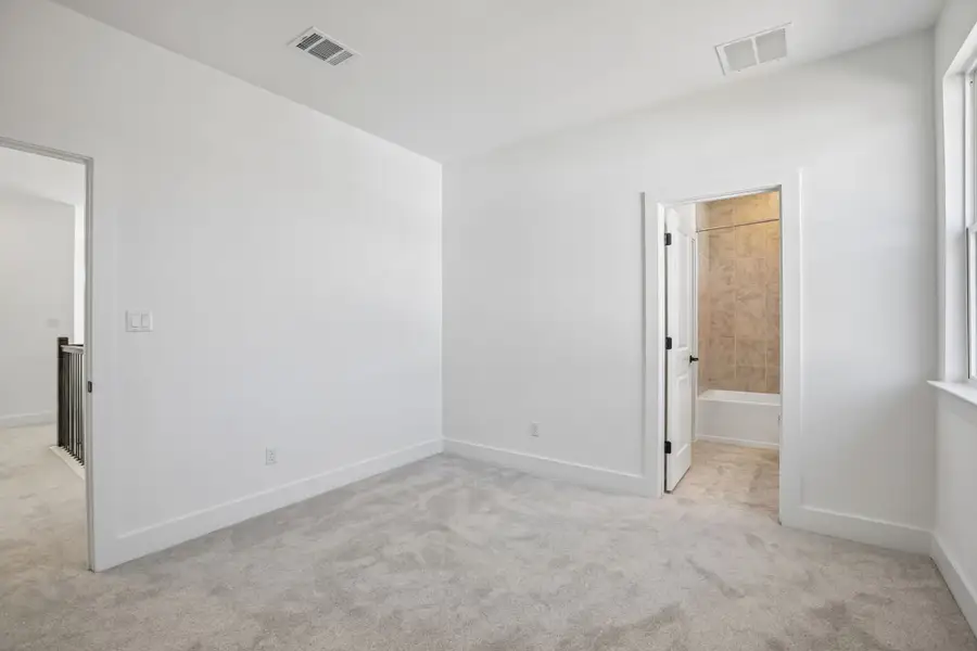 Representative unfurnished interior of a home built from the Anderson by Taylor Morrison in Easton Park, Austin (Image 39).