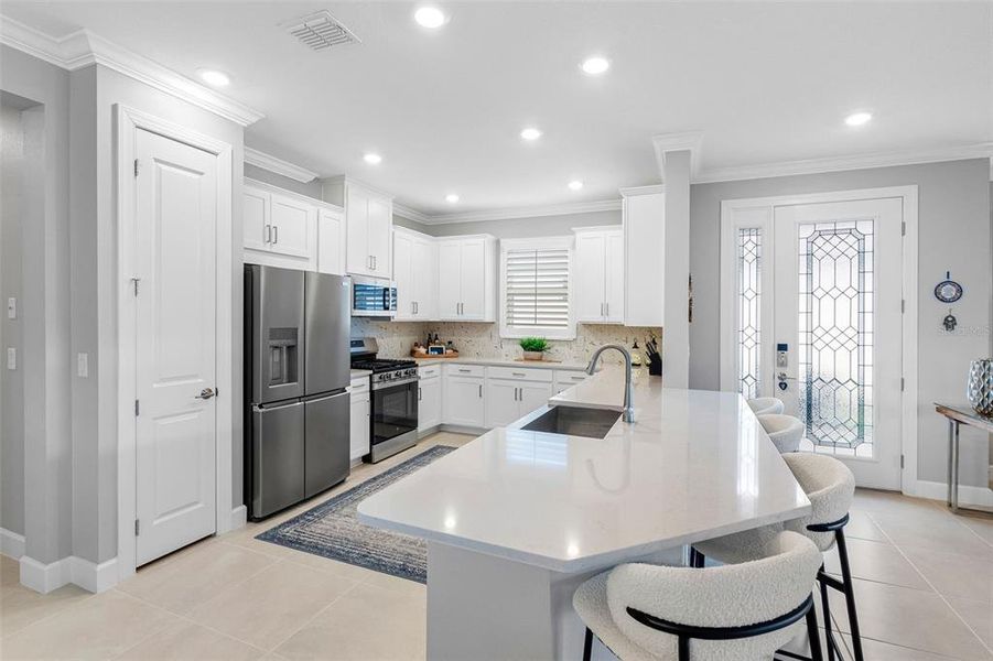 Furnished interior view inside a new home in Esplanade at Wiregrass Ranch, Wesley Chapel (Image 6).