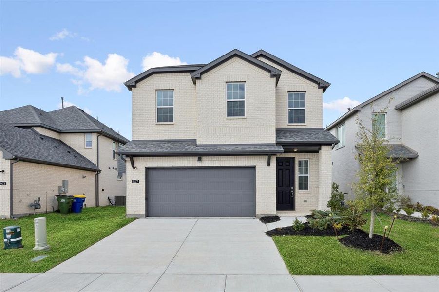 Front exterior of a new home in Santorini, Seagoville, TX, highlighting curb appeal (Image 1). Front exterior of a new home in Santorini, Seagoville, TX, highlighting curb appeal (Image 1).