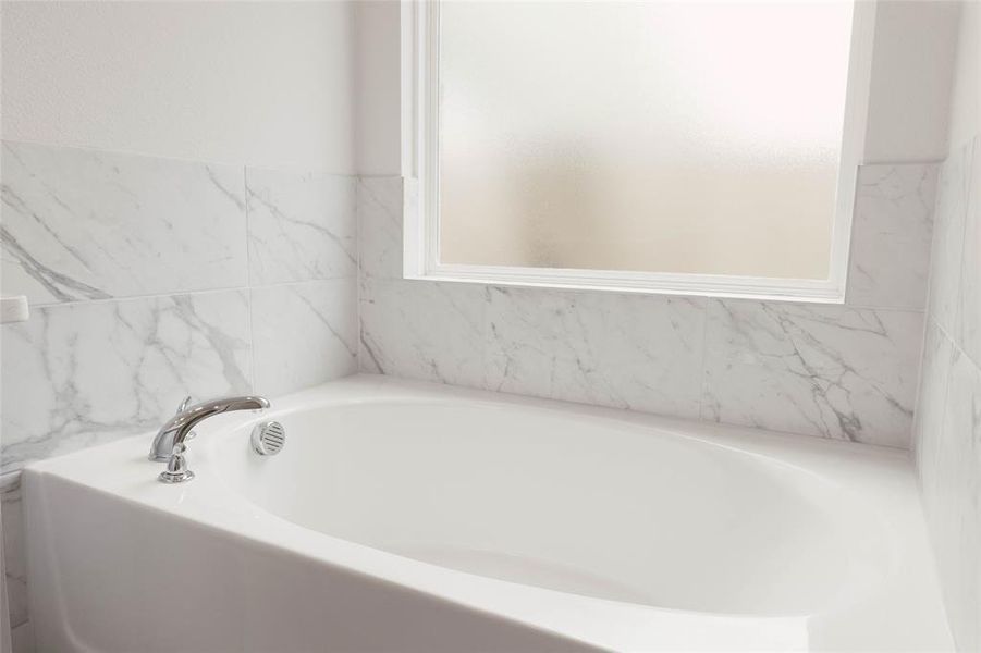 Bathroom featuring a bathing tub