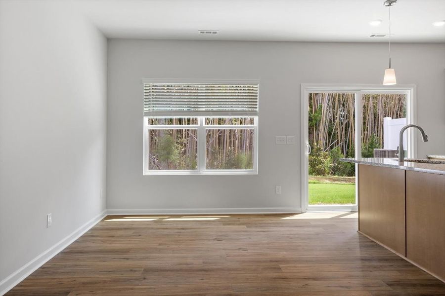 Spacious, unfurnished interior of a new home in West Main Townhomes, Sanford (Image 18).