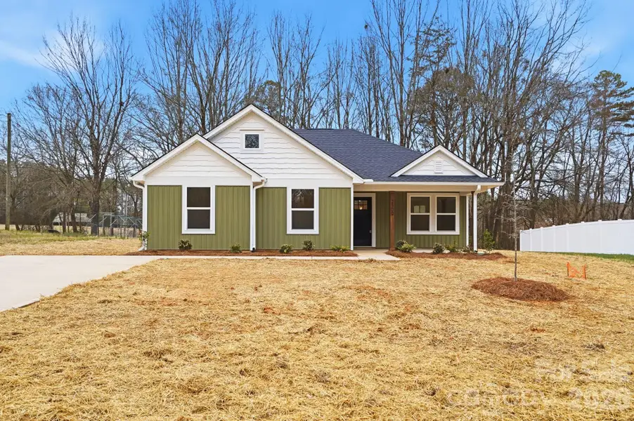 Front exterior of a new home in , Gastonia, NC, highlighting curb appeal (Image 1). Front exterior of a new home in , Gastonia, NC, highlighting curb appeal (Image 1).
