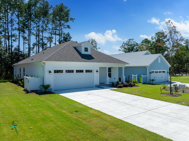 Representative exterior photo of a completed home built from the Sand Dune by Bill Clark Homes in Osprey Landing, Southport, NC (Image 21).