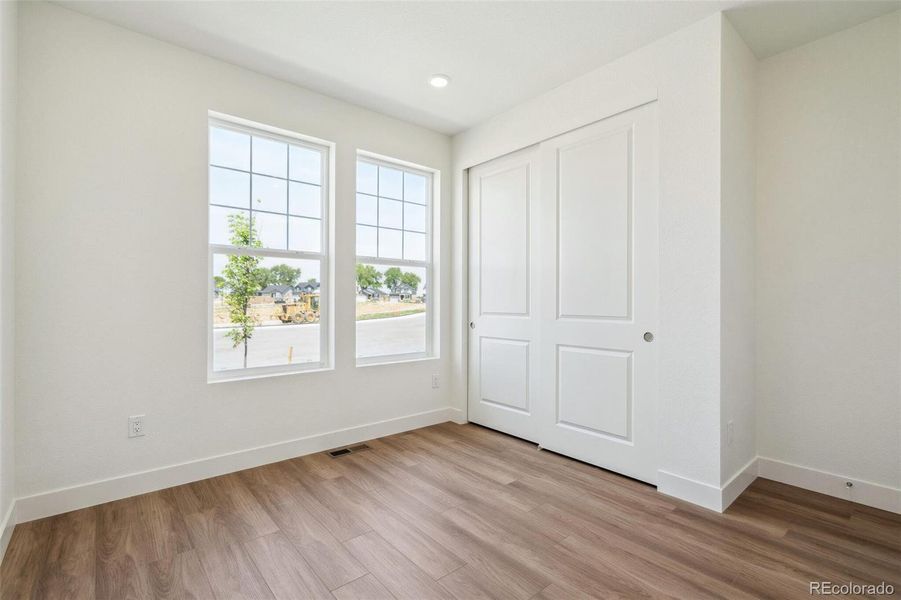 Spacious, unfurnished interior of a new home in Windsong, Thornton (Image 25).