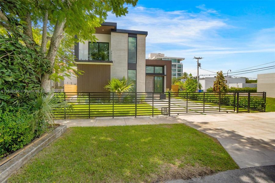 Front exterior of a new home in , Miami, FL, highlighting curb appeal (Image 31). Front exterior of a new home in , Miami, FL, highlighting curb appeal (Image 31).