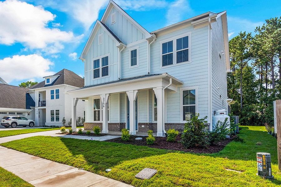 Representative exterior photo of a completed home built from the The Wentworth by RobuckHomes in East & Mason, Wilmington, NC (Image 15). Representative exterior photo of a completed home built from the The Wentworth by RobuckHomes in East & Mason, Wilmington, NC (Image 15).