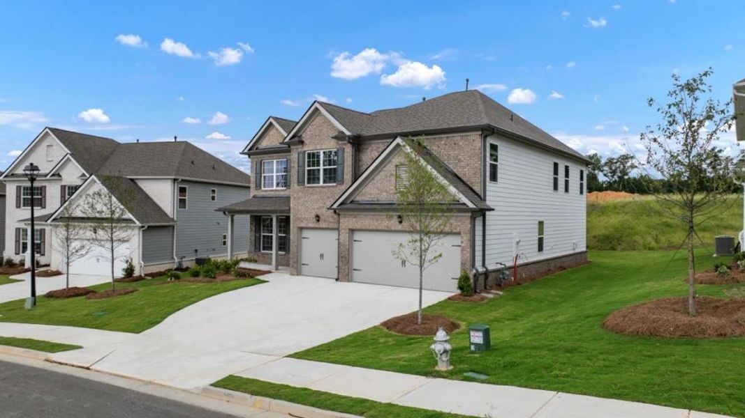 Front exterior of a new home in Butner Estates, College Park, GA, highlighting curb appeal (Image 29).
