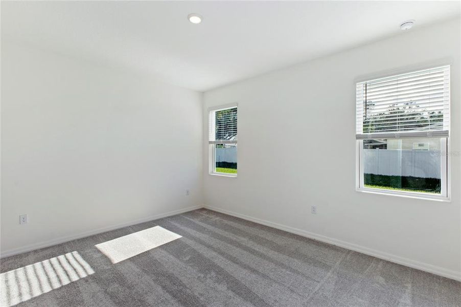 Spacious, unfurnished interior of a new home in Mirror Lake Village, Fruitland Park (Image 15).