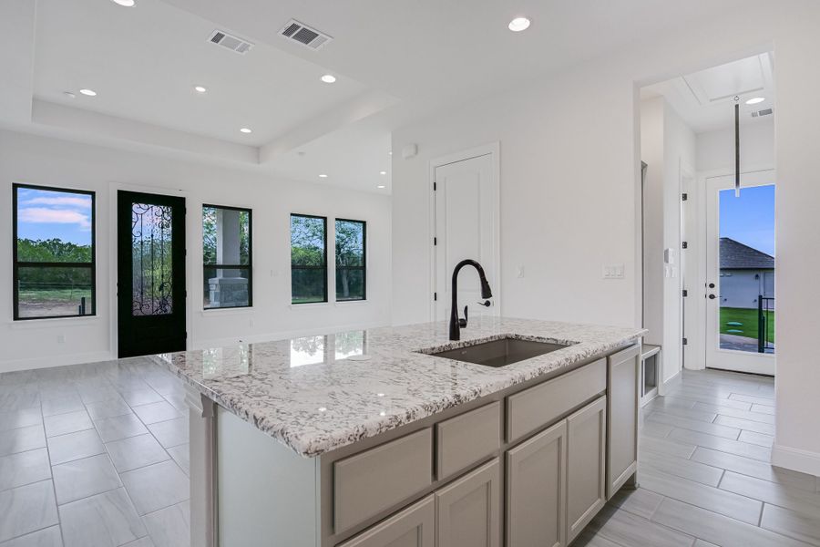 Representative furnished interior of a home built from the Casita by Giddens Homes in Whispering Wind, Bertram (Image 43).