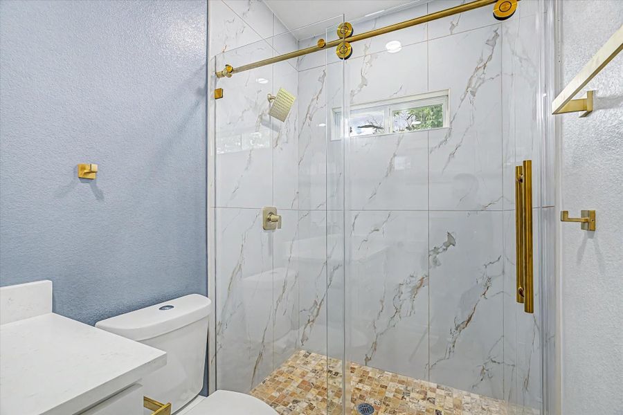 Shower w/ glass doors Shower w/ glass doors