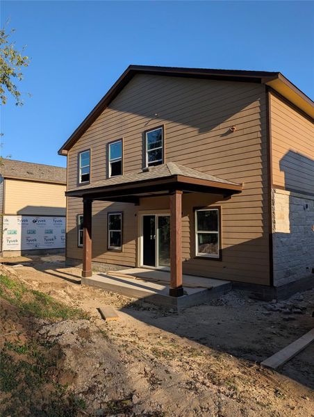 Back of property featuring a patio