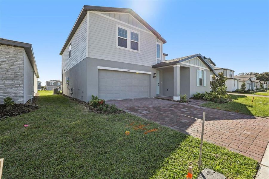 Exterior details and patio area of a home in The Reserve at Twin Lakes, St. Cloud (Image 3). Exterior details and patio area of a home in The Reserve at Twin Lakes, St. Cloud (Image 3).