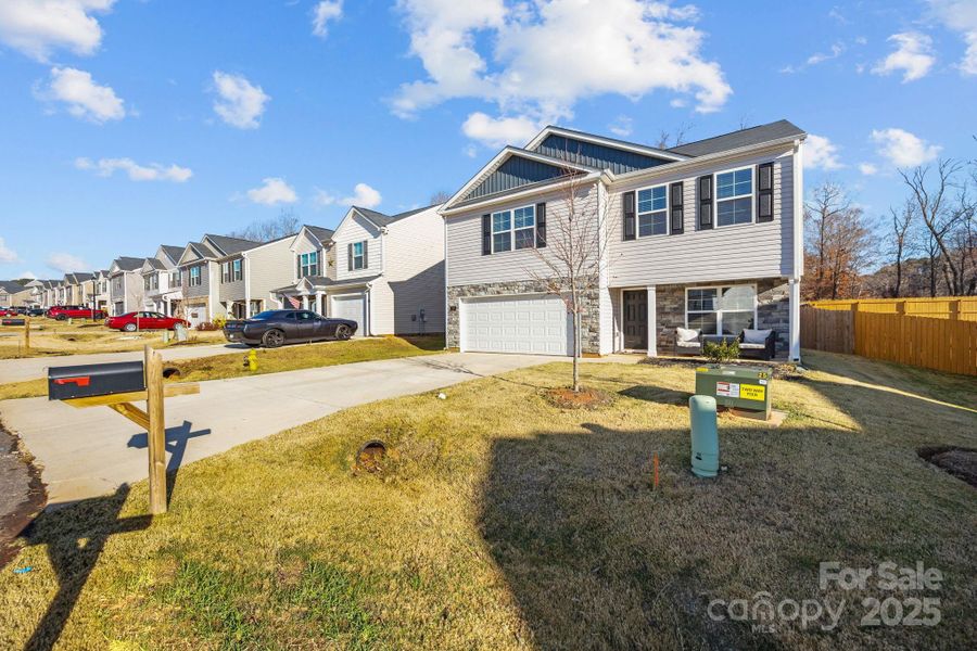 Exterior details and patio area of a home in , Mocksville (Image 31).