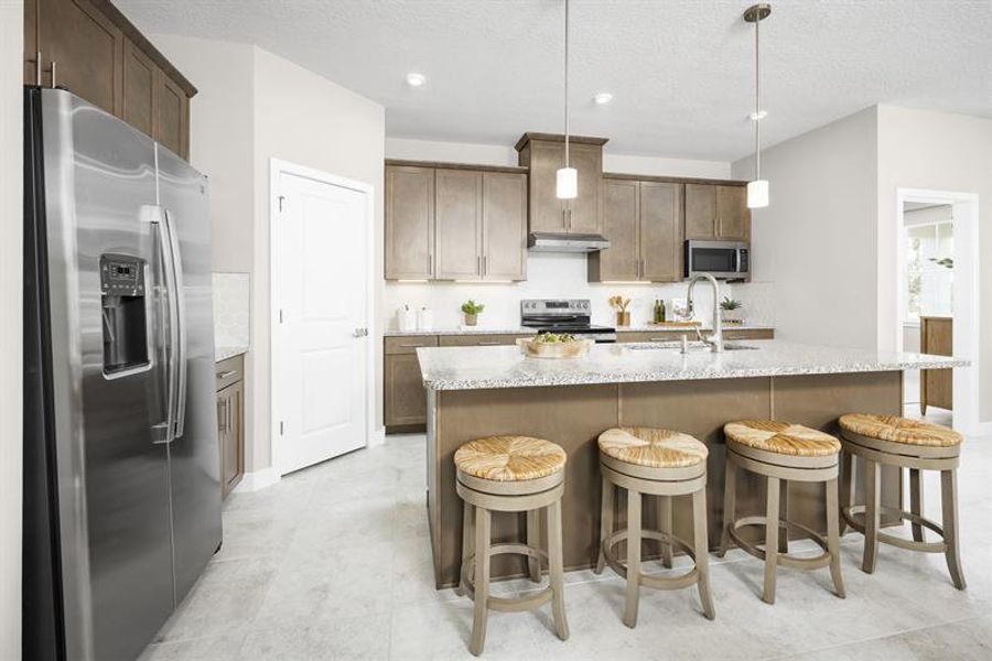Representative furnished interior of a home built from the Grove by Ryan Homes in Malabar Springs, Palm Bay (Image 5).