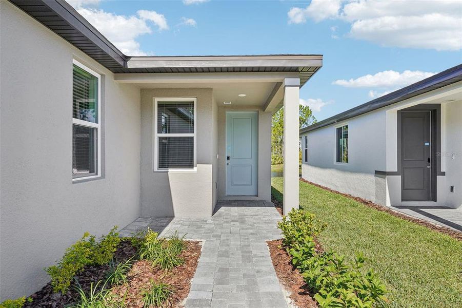 Exterior details and patio area of a home in Ridgehaven - Villas, Ormond Beach (Image 24).