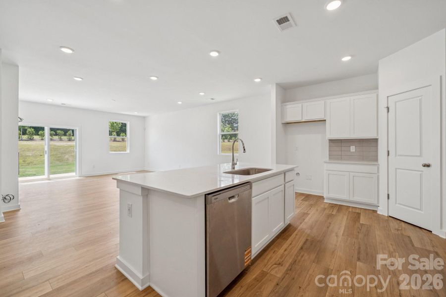 Furnished interior view inside a new home in Meadow Creek Village, Locust (Image 3).