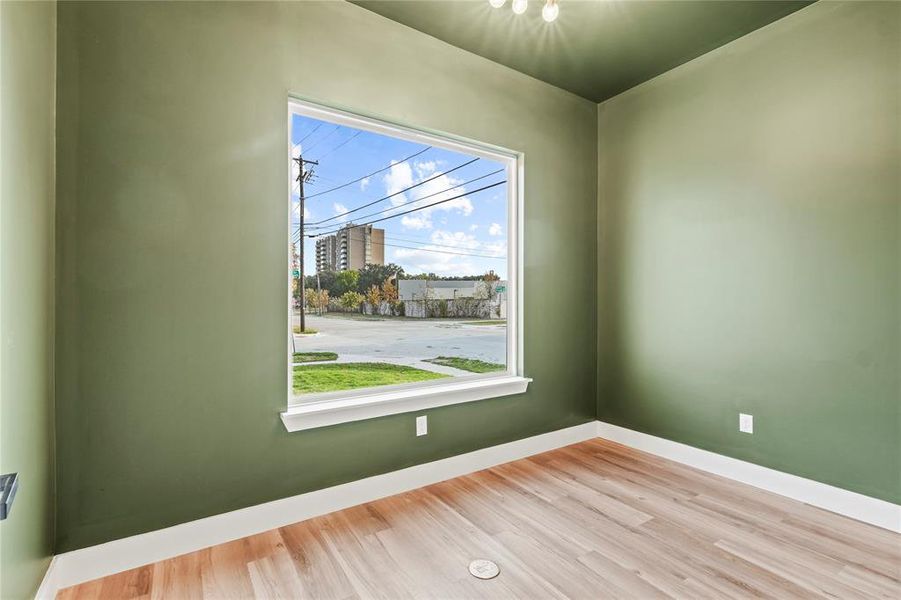 Empty room featuring light wood-style floors and baseboards